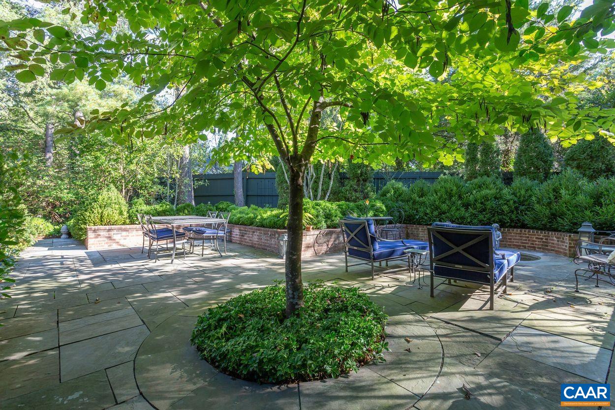 1310 Blue Ridge Road Charlottesville, VA 22903 - Photo 35 of 50 a view of a backyard with sitting area
