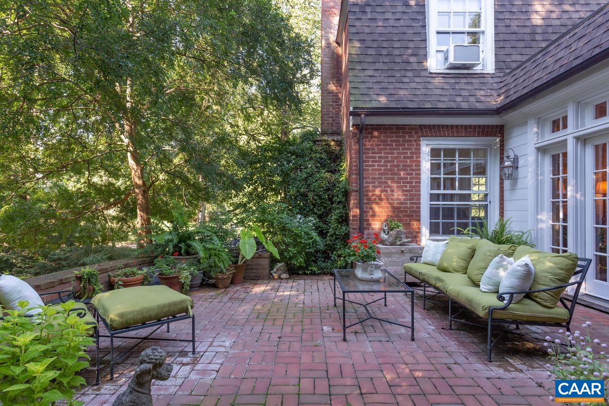 1310 Blue Ridge Road Charlottesville, VA 22903 - Photo 36 of 50 a backyard of a house with seating space