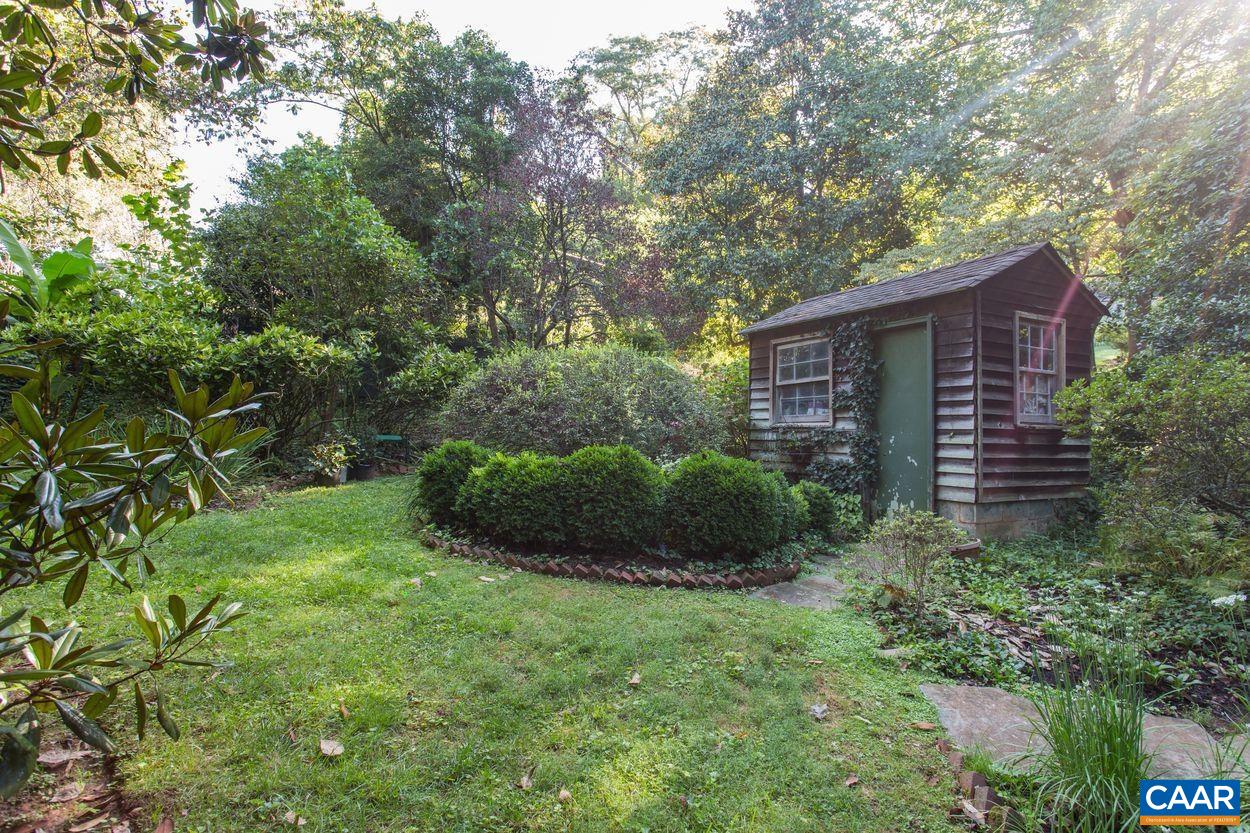 1310 Blue Ridge Road Charlottesville, VA 22903 - Photo 44 of 50 a view of a house with a yard and plants