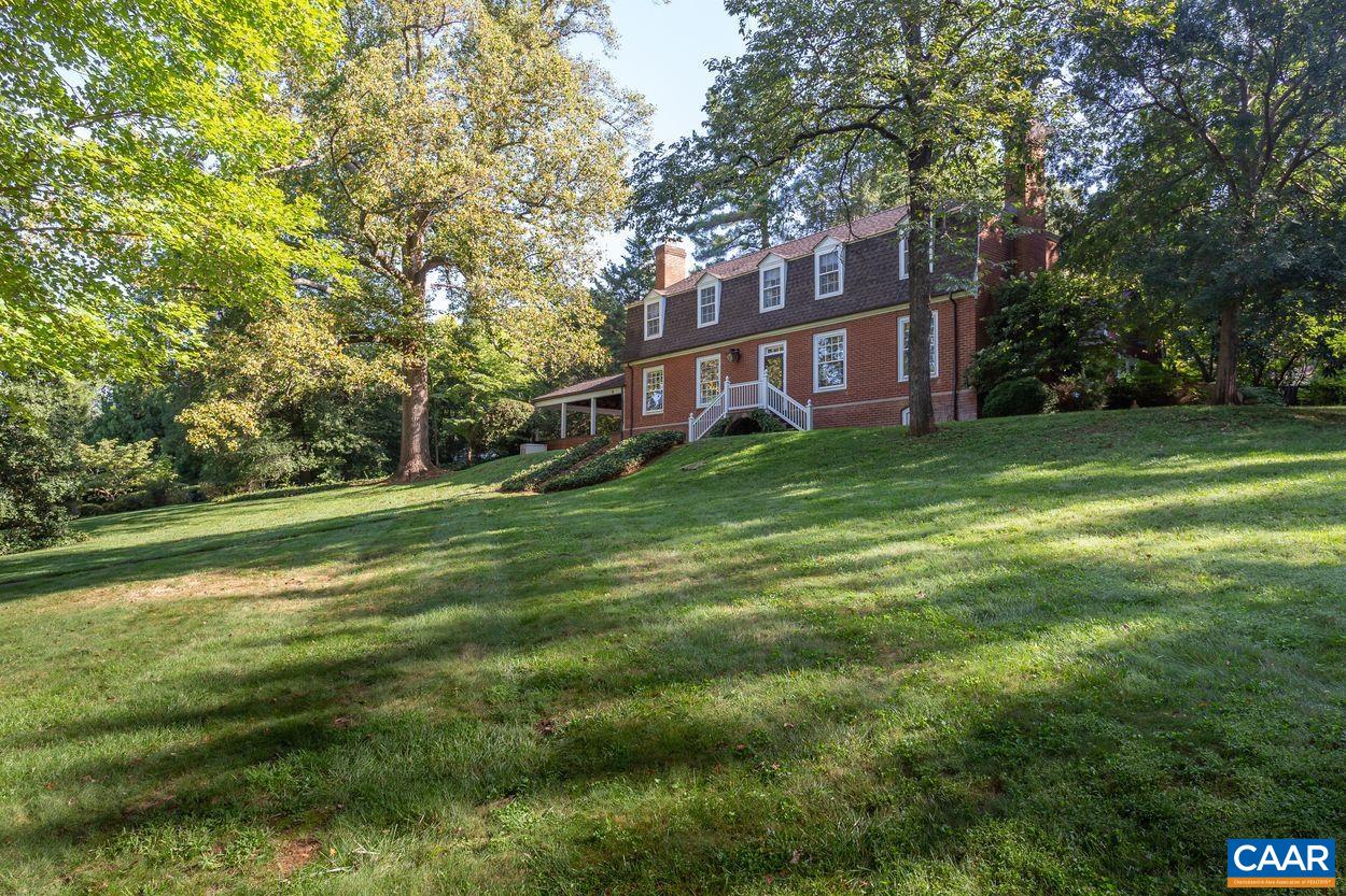 1310 Blue Ridge Road Charlottesville, VA 22903 - Photo 50 of 50 a view of a house with a big yard and large trees