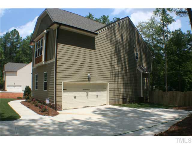 1400 Trinity Road, Unit LOT16 Cary, NC 27513 - Photo 3 of 25 a view of back yard of the house