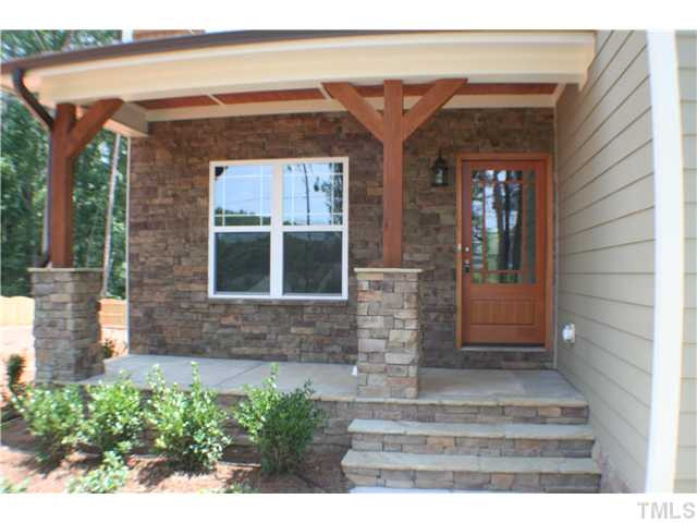 1400 Trinity Road, Unit LOT16 Cary, NC 27513 - Photo 4 of 25 a front view of a house