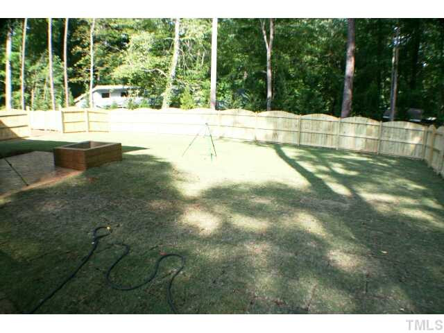 1400 Trinity Road, Unit LOT16 Cary, NC 27513 - Photo 8 of 25 a view of backyard with large trees