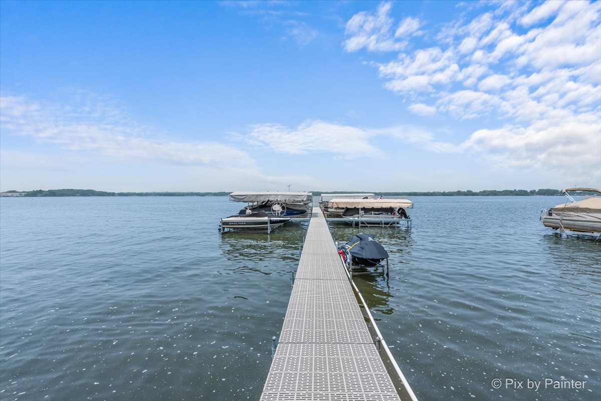 150 Eagle Point Road, Unit P Fox Lake, IL 60020 - Photo 6 of 33 a view of a lake with roof