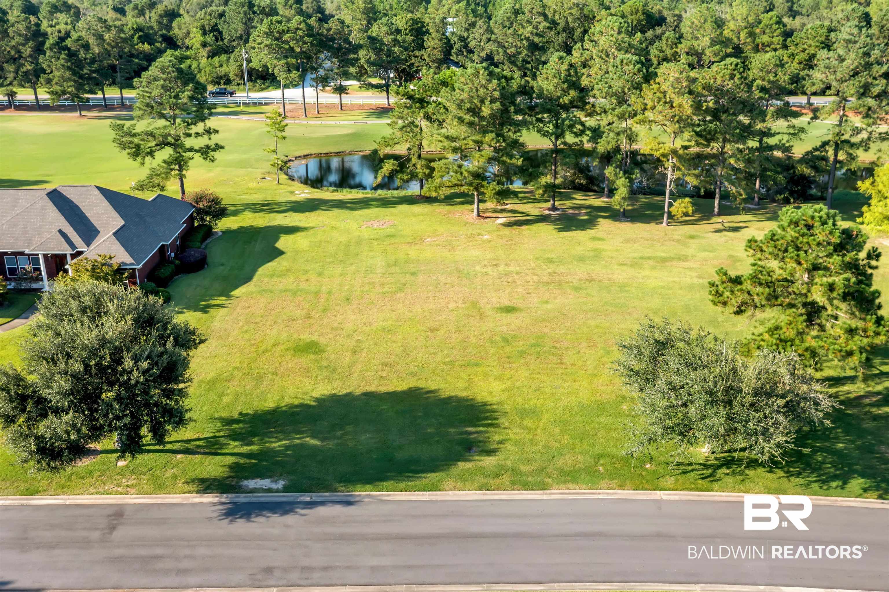 Lakes Circle Gulf Shores, AL 36542 - Photo 14 of 15 Drone / aerial view of a nearby body of water