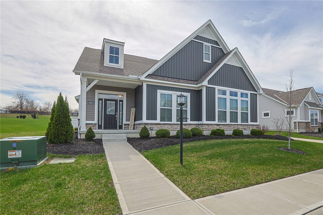 5013 Arena Court Hamilton, OH 45011 - Photo 1 of 41 This residence showcases attractive siding and well-maintained landscaping, creating an inviting curb appeal.