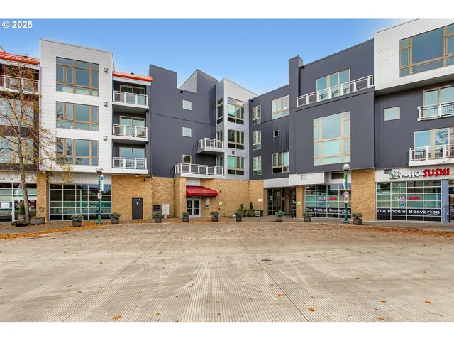 a view of a patio with chair and potted plants
