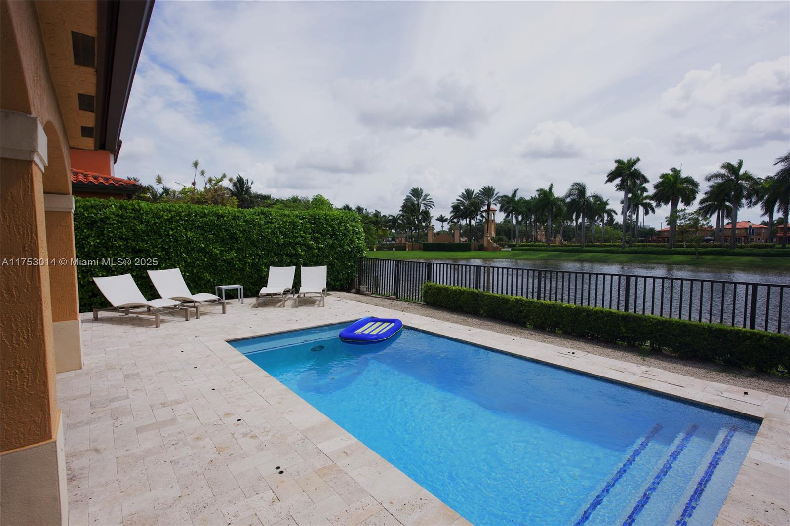 2631 Southwest 153rd Path, Unit 2631 Miami, FL 33185 - Photo 26 of 29 swimming pool view with a garden space