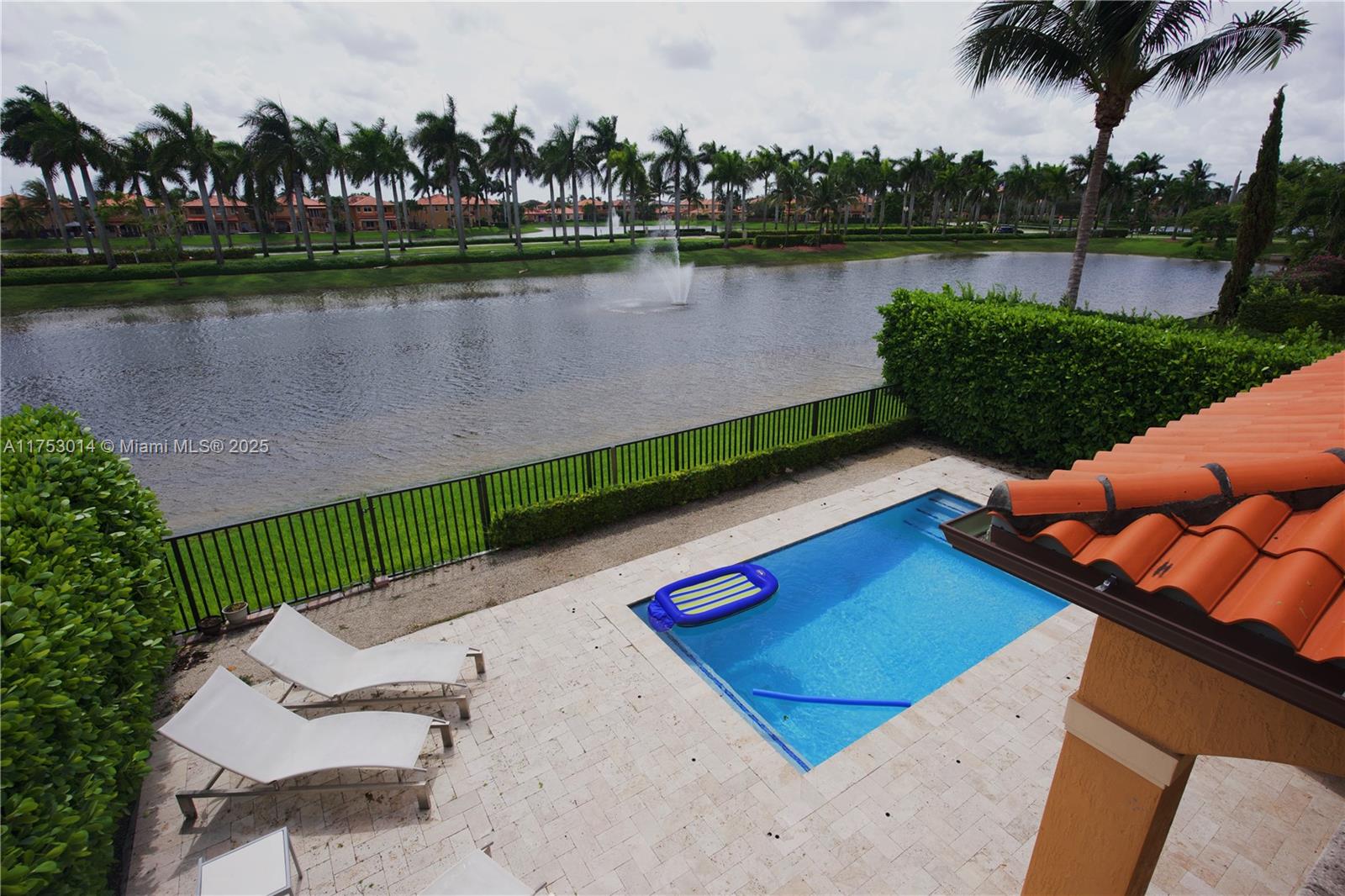 2631 Southwest 153rd Path, Unit 2631 Miami, FL 33185 - Photo 28 of 29 an aerial view of a house with outdoor space and lake view