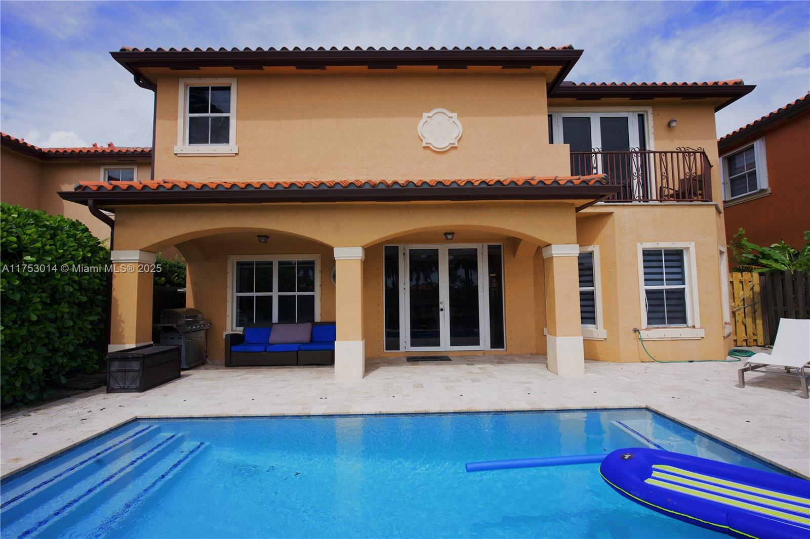 2631 Southwest 153rd Path, Unit 2631 Miami, FL 33185 - Photo 29 of 29 a view of a house with a patio