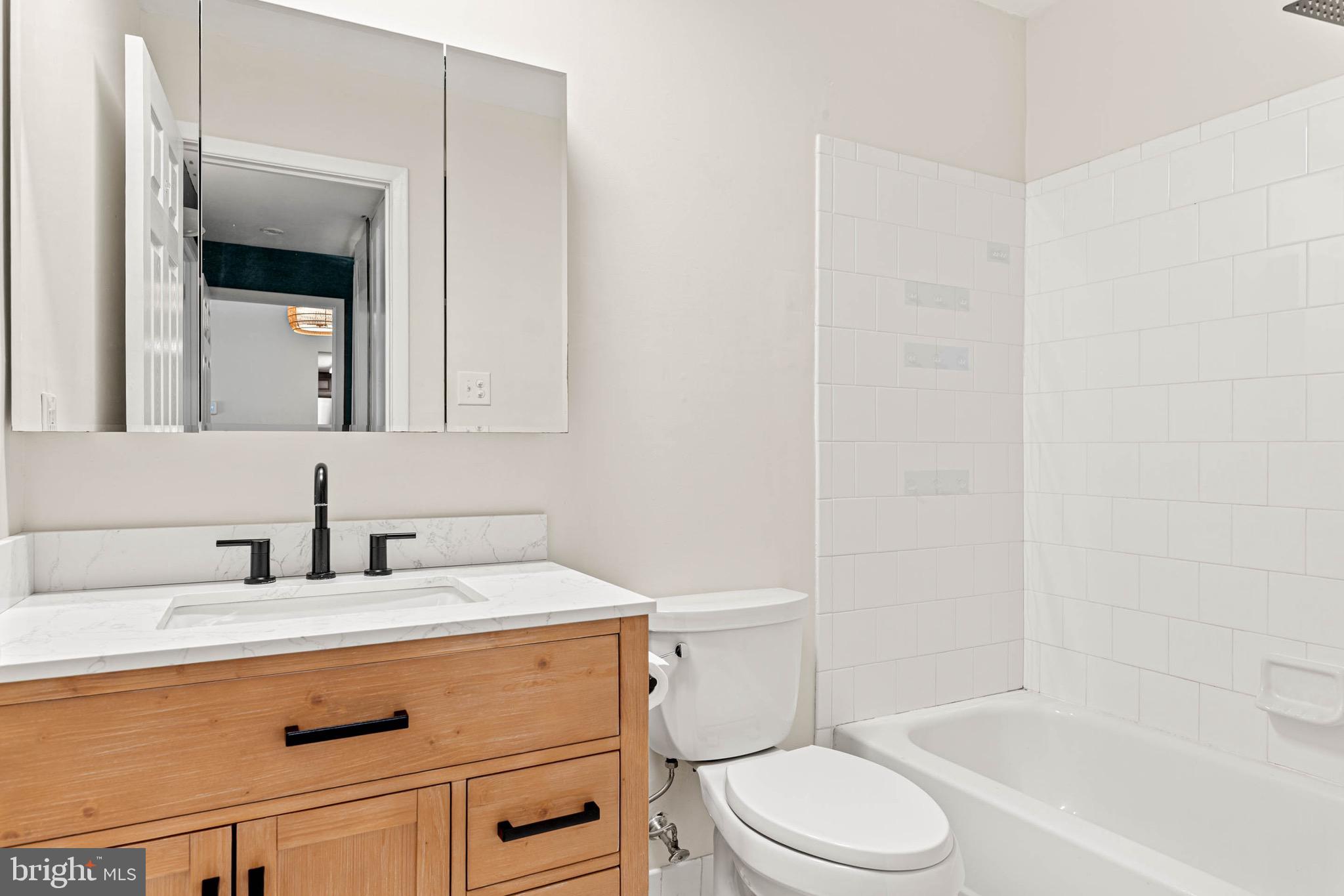 423 Old Forge Crossing, Unit 423 Devon, PA 19333 - Photo 16 of 24 Renovated Bathroom