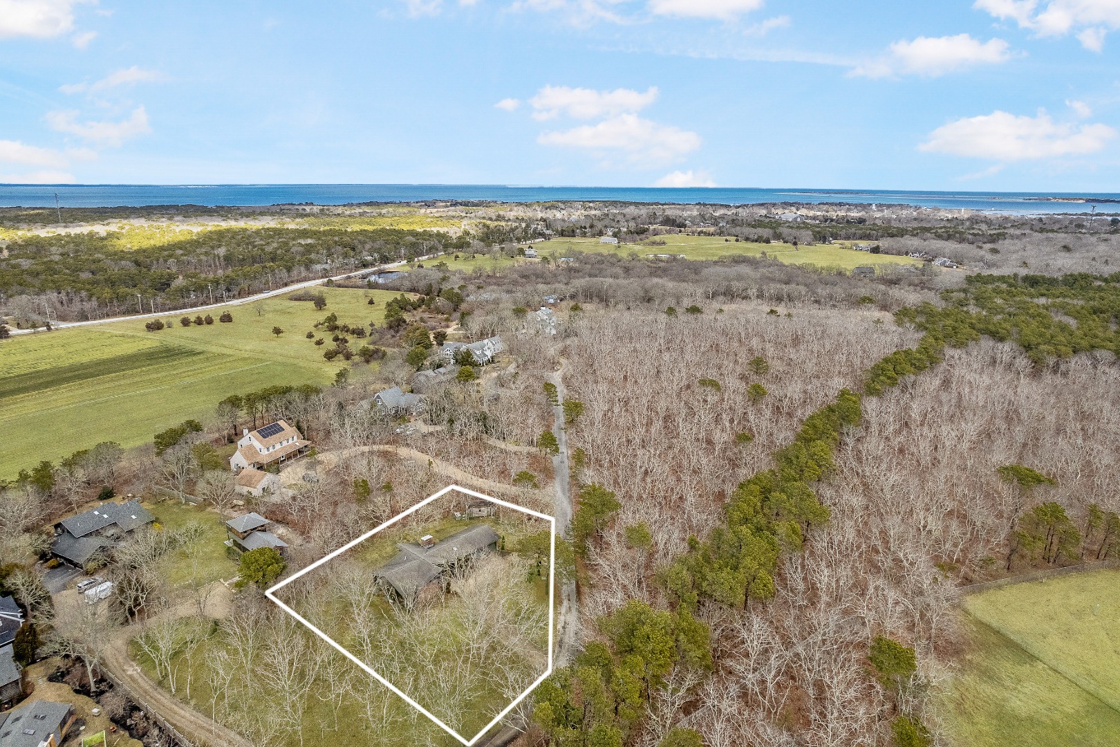 21 Llewellyn Way Edgartown, MA 02539 - Photo 31 of 34 a view of an ocean and beach