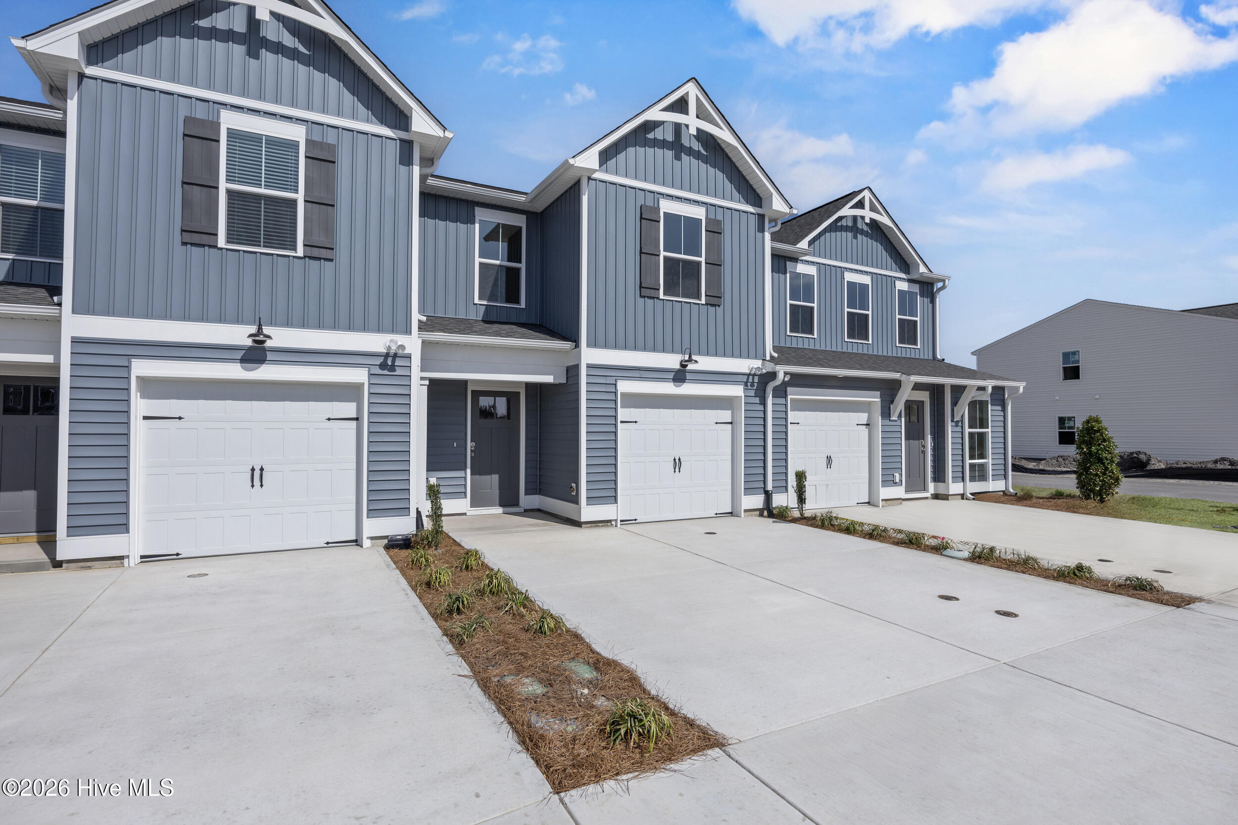 16 West Pioneer Way, Unit 130 Hampstead, NC 28443 - Photo 2 of 36 6_front exterior