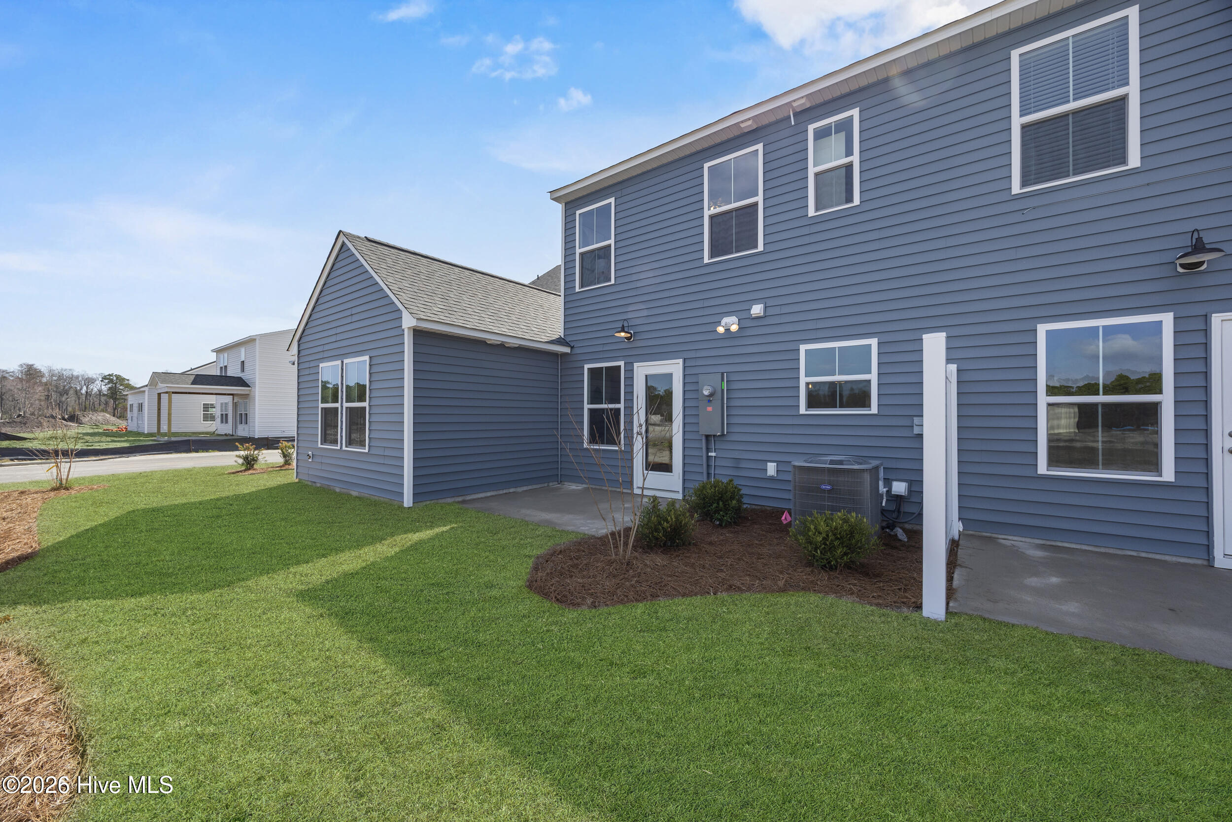 16 West Pioneer Way, Unit 130 Hampstead, NC 28443 - Photo 7 of 36 35_back exterior