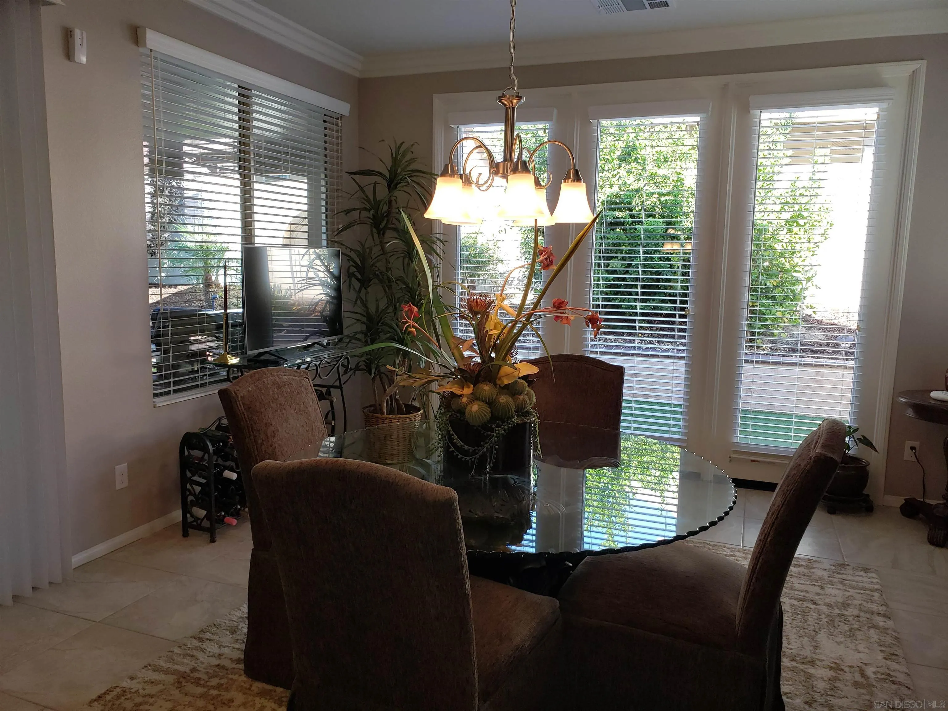 1624 Paseo Diamonte Hemet, CA 92545 - Photo 11 of 35 a view of a dining room with furniture window and outside view