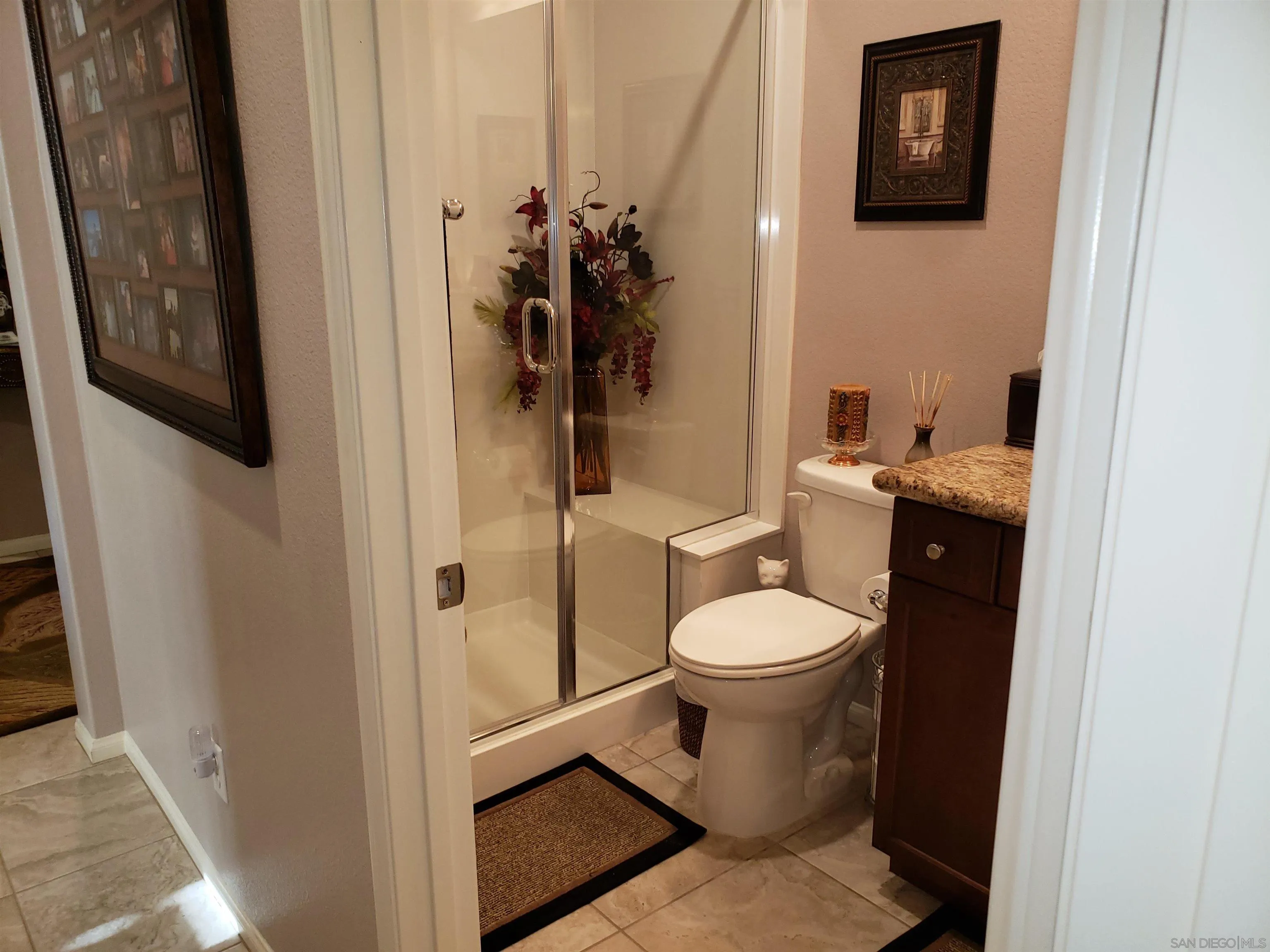 1624 Paseo Diamonte Hemet, CA 92545 - Photo 17 of 35 a white toilet sitting next to a bathroom sink