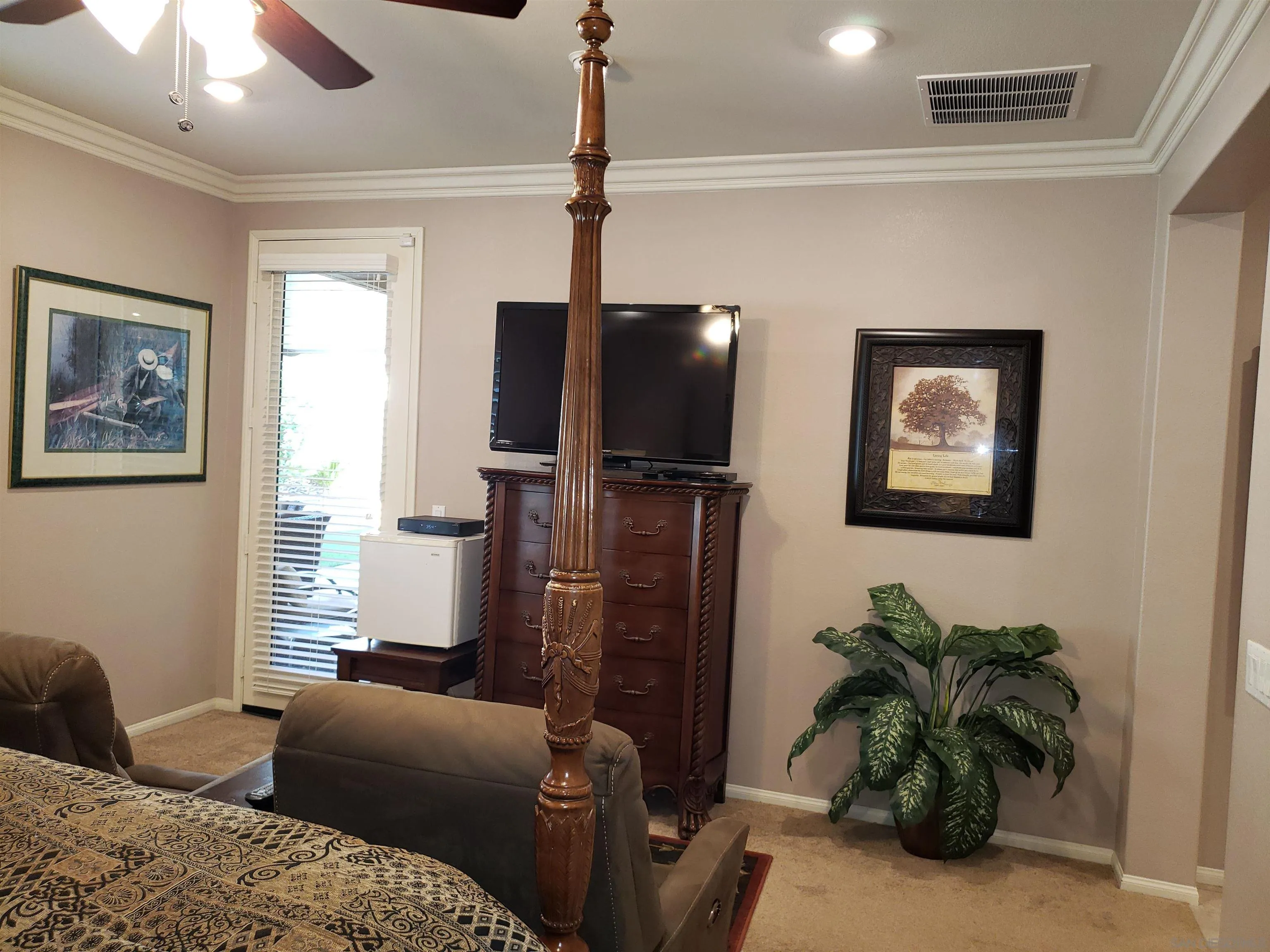1624 Paseo Diamonte Hemet, CA 92545 - Photo 19 of 35 a living room with furniture and a flat screen tv