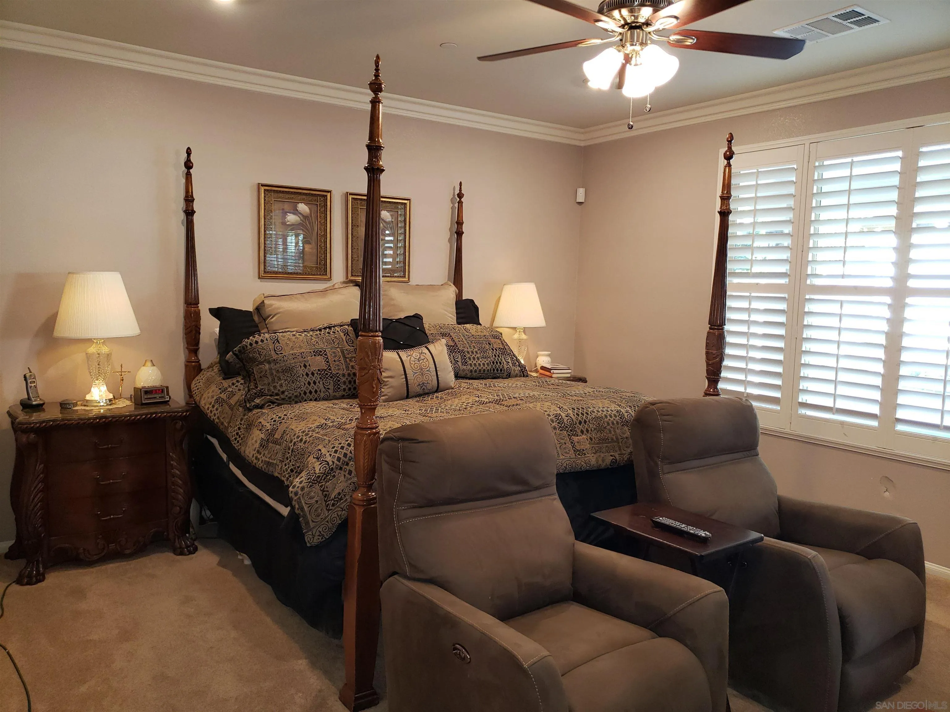 1624 Paseo Diamonte Hemet, CA 92545 - Photo 20 of 35 a living room with furniture and a lamp
