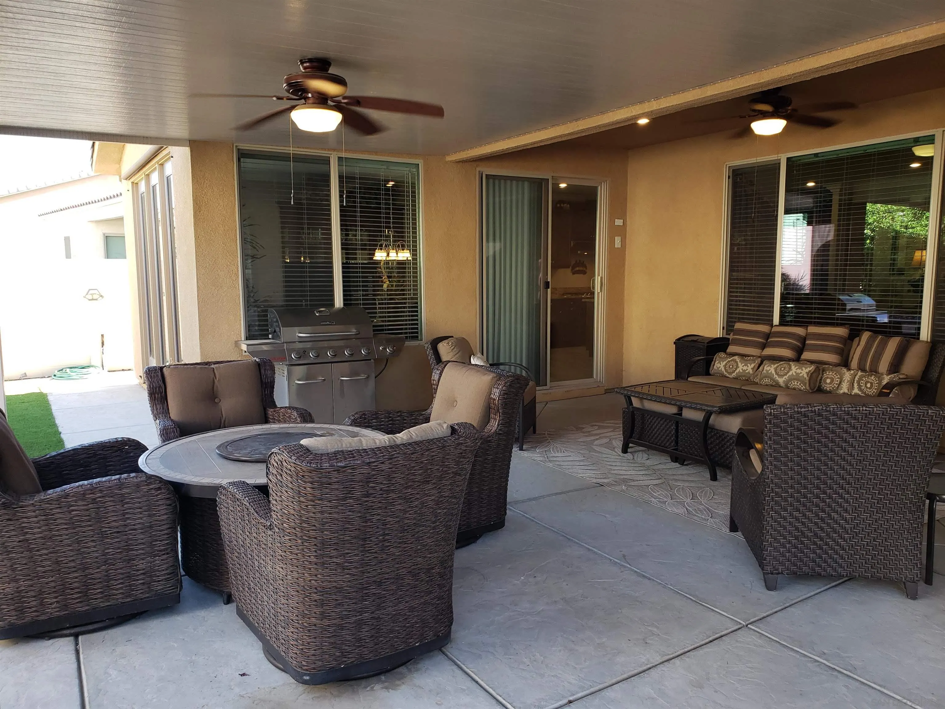 1624 Paseo Diamonte Hemet, CA 92545 - Photo 25 of 35 a living room with furniture and a chandelier