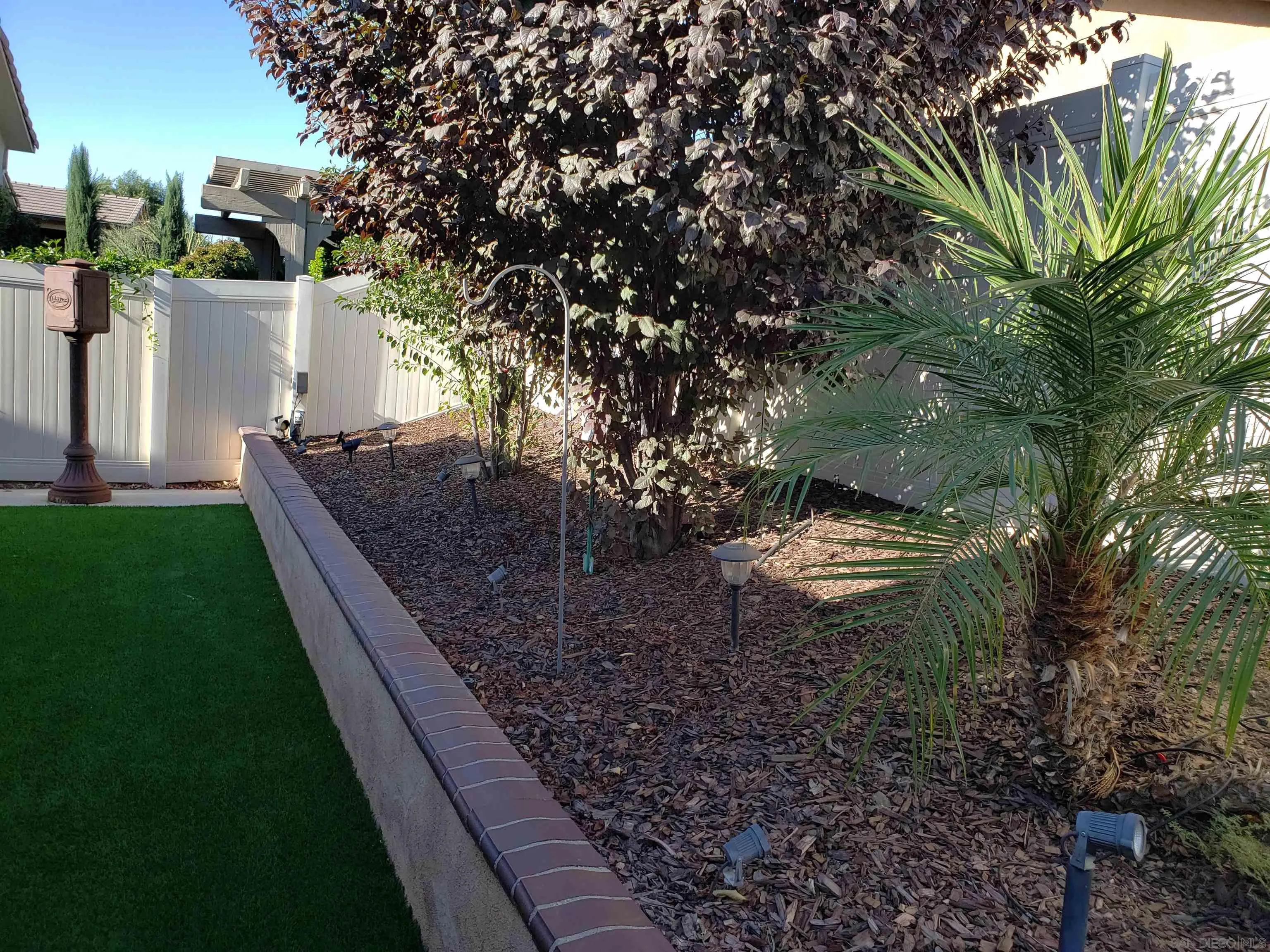 1624 Paseo Diamonte Hemet, CA 92545 - Photo 27 of 35 a backyard of a house with lots of green space