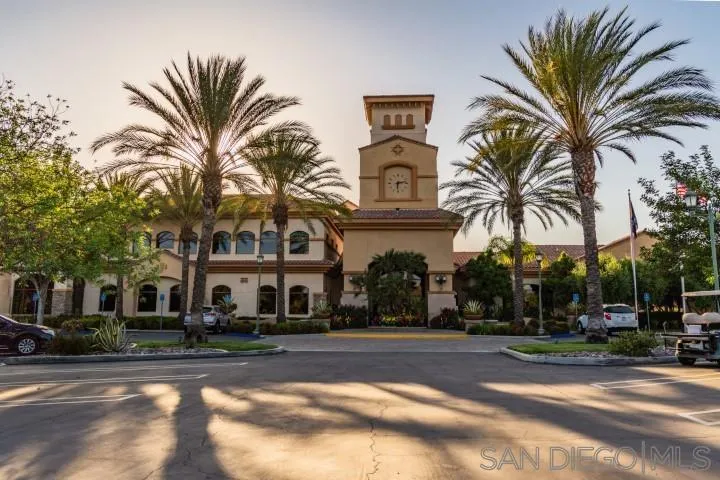 1624 Paseo Diamonte Hemet, CA 92545 - Photo 29 of 35 a view of a multi story building with a palm tree