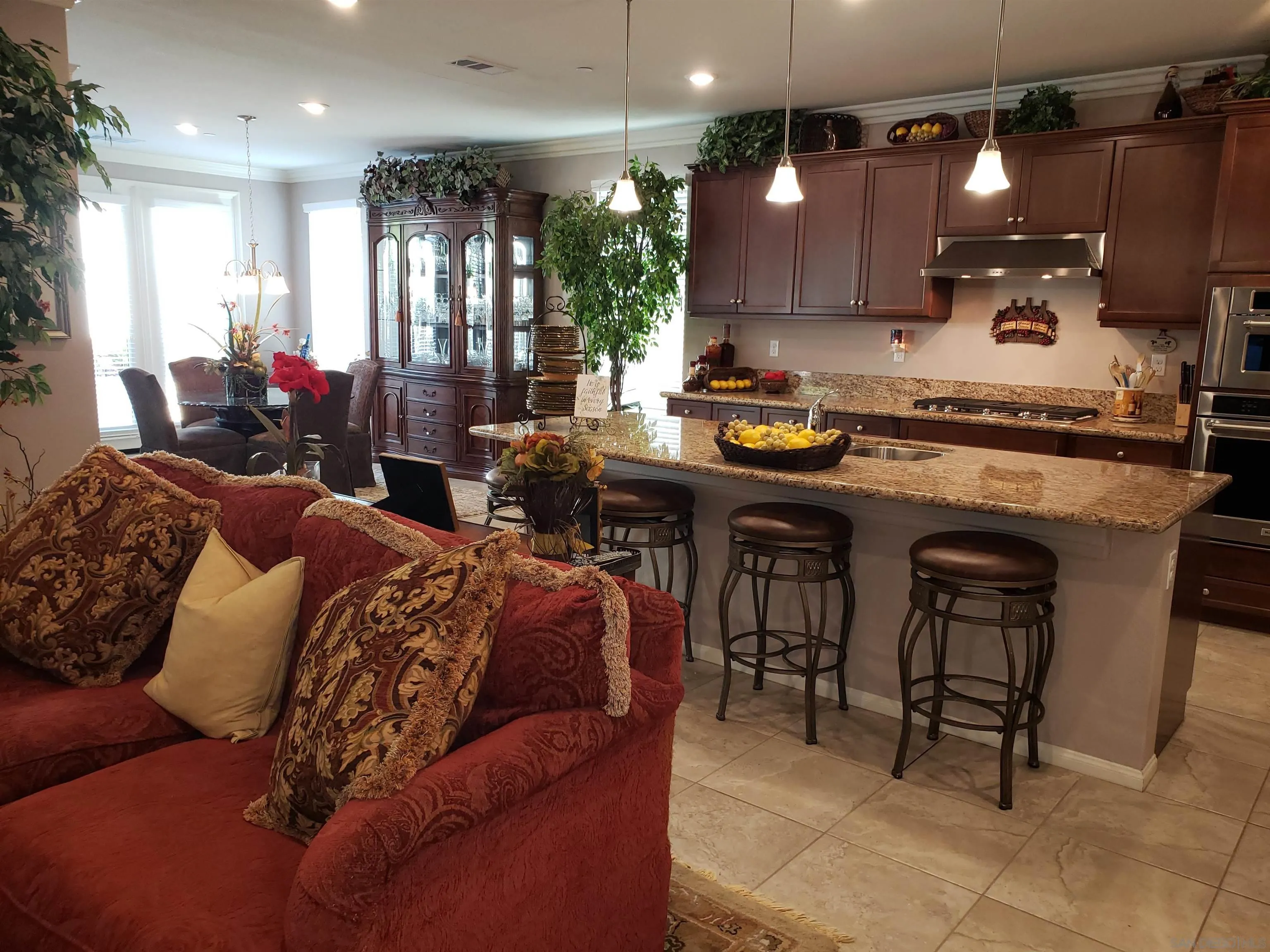 1624 Paseo Diamonte Hemet, CA 92545 - Photo 8 of 35 a living room with furniture a counter top space a sink and a window