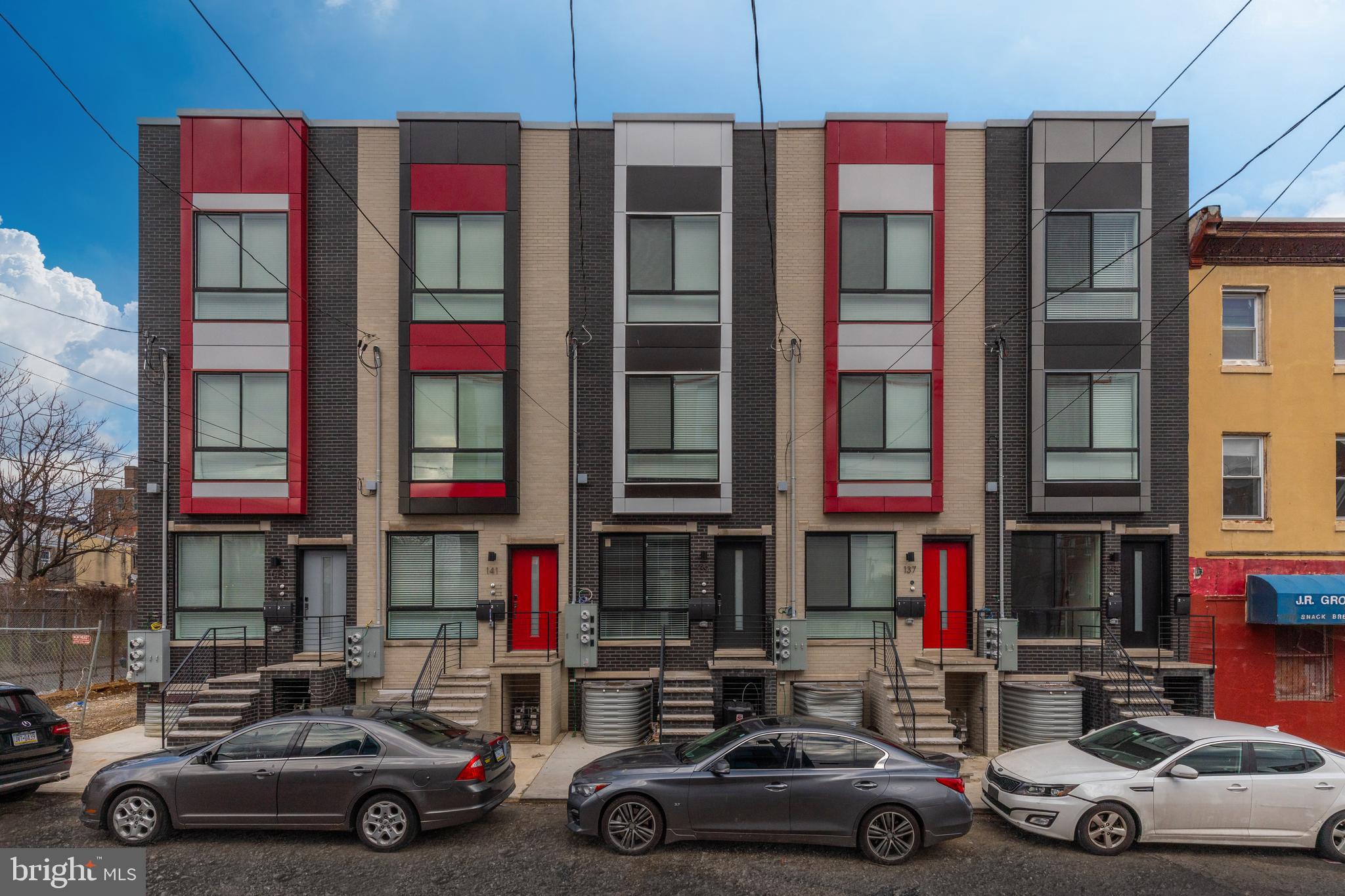 141 West Huntingdon Street, Unit 1 Philadelphia, PA 19133 - Photo 20 of 21 a car parked in front of a store