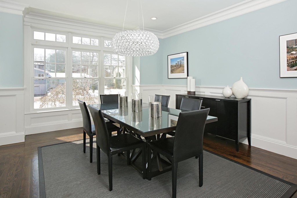 25 Marthas Lane Brookline, MA 02467 - Photo 4 of 10 a view of a dining room with furniture a chandelier and wooden floor