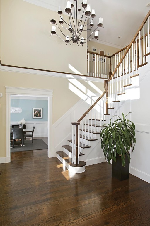 25 Marthas Lane Brookline, MA 02467 - Photo 5 of 10 a view of entryway and hall with wooden floor