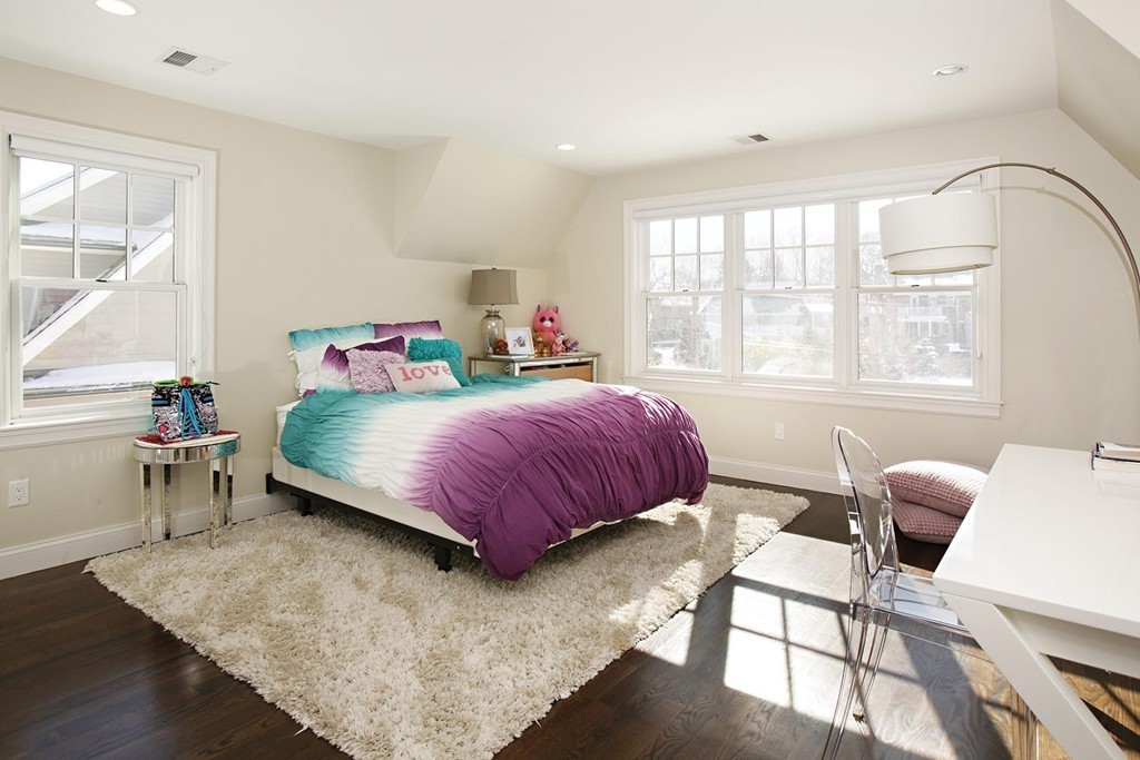 25 Marthas Lane Brookline, MA 02467 - Photo 8 of 10 a bedroom with a bed chair and window