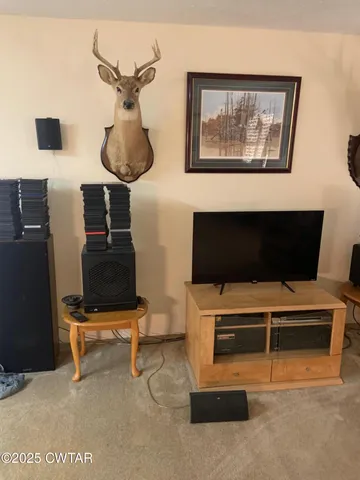a kitchen with a sink cabinets and window