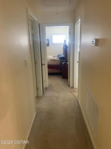 a bathroom with a sink a toilet and a shower