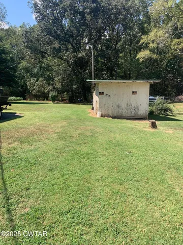 a view of outdoor space and yard