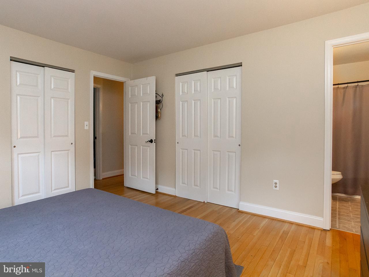 17521 Troyer Road Monkton, MD 21111 - Photo 11 of 29 a bedroom with a bed and wooden floor