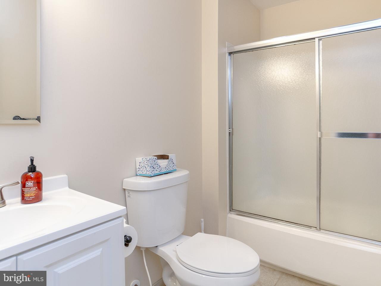 17521 Troyer Road Monkton, MD 21111 - Photo 15 of 29 a white toilet sitting next to a bathroom sink