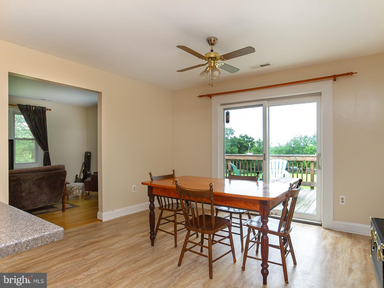 17521 Troyer Road Monkton, MD 21111 - Photo 17 of 29 a view of a dining room with furniture window and wooden floor