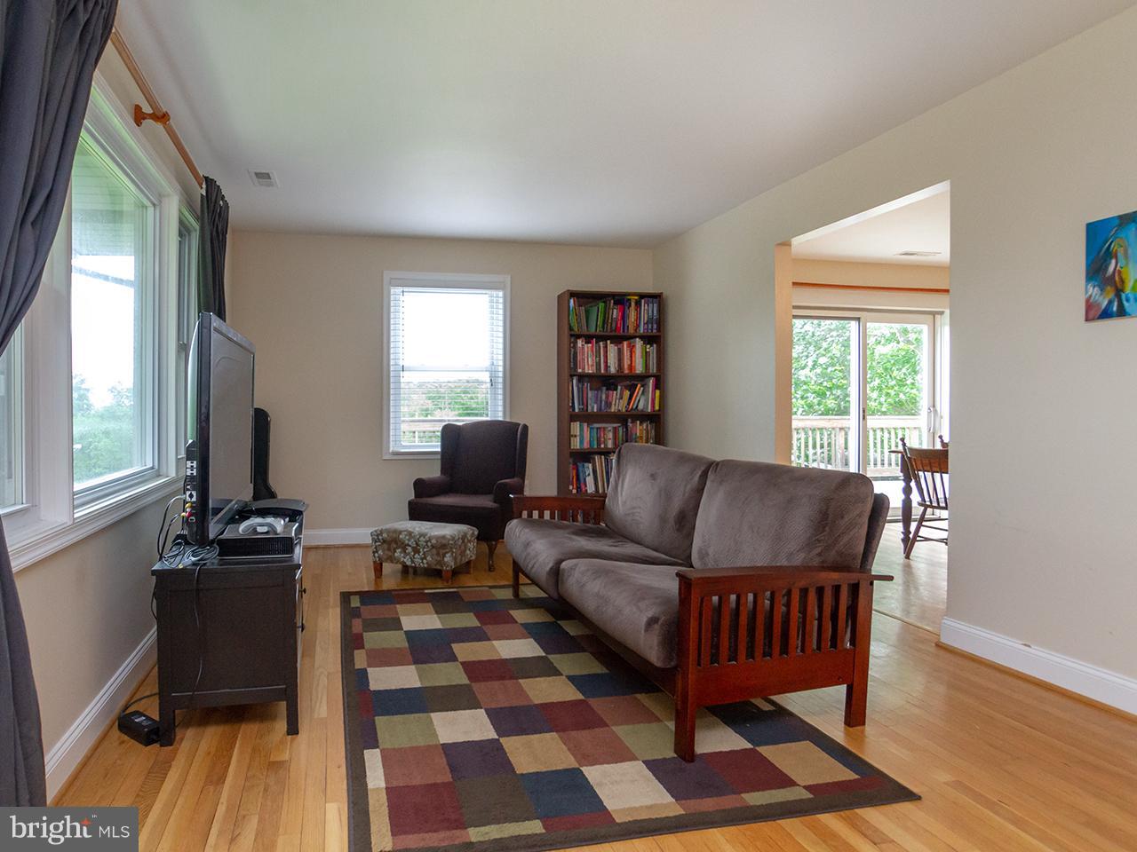 17521 Troyer Road Monkton, MD 21111 - Photo 3 of 29 a living room with furniture and a rug