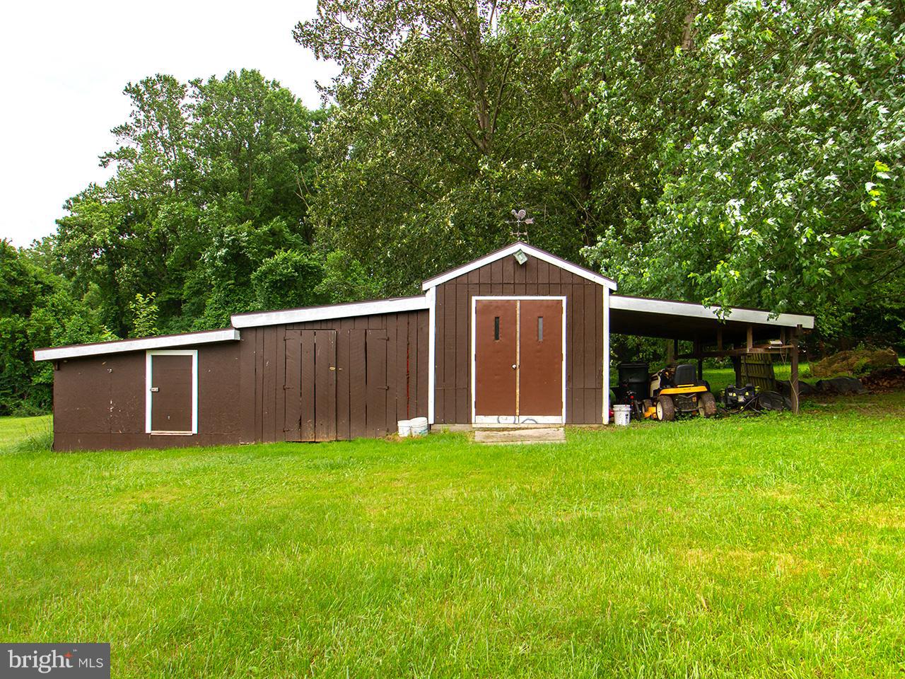 17521 Troyer Road Monkton, MD 21111 - Photo 29 of 29 a view of a house with backyard and porch