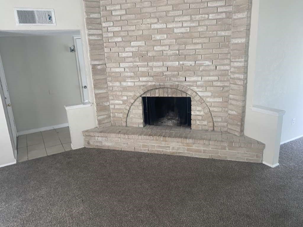 22706 Hawkwood Drive Spring, TX 77373 - Photo 2 of 10 a living room with a fireplace