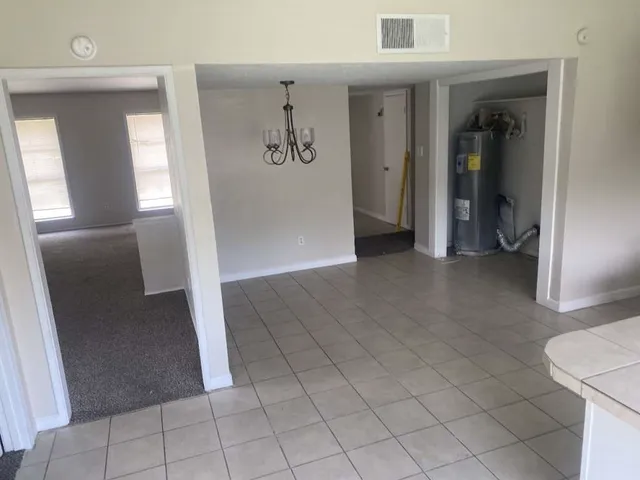 an entryway view with staircase