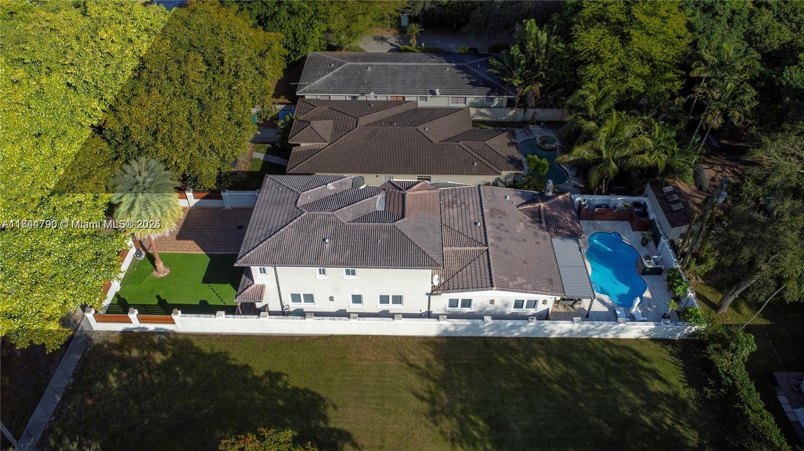 5320 Sunset Drive Miami, FL 33143 - Photo 41 of 45 an aerial view of a house with a yard