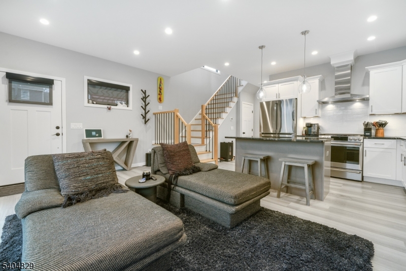 71 Witte Road West Milford, NJ 07421 - Photo 12 of 42 a living room with furniture and kitchen view