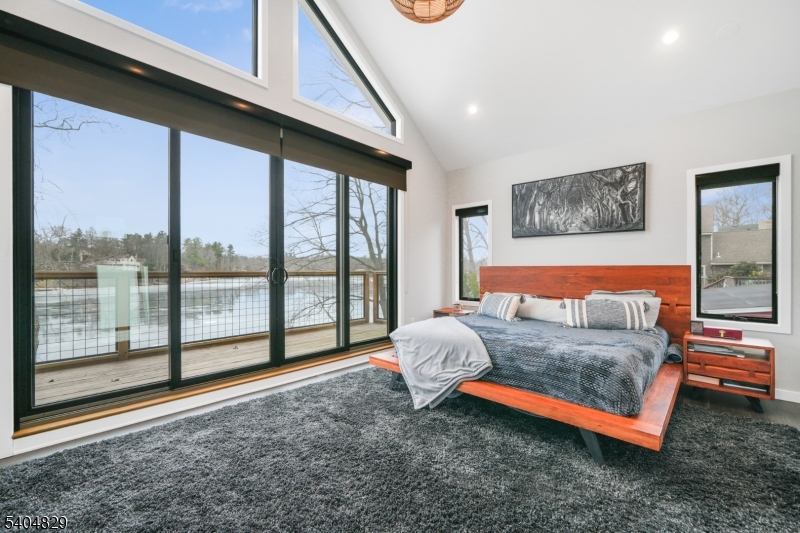 71 Witte Road West Milford, NJ 07421 - Photo 16 of 42 a living room with a bed and large window