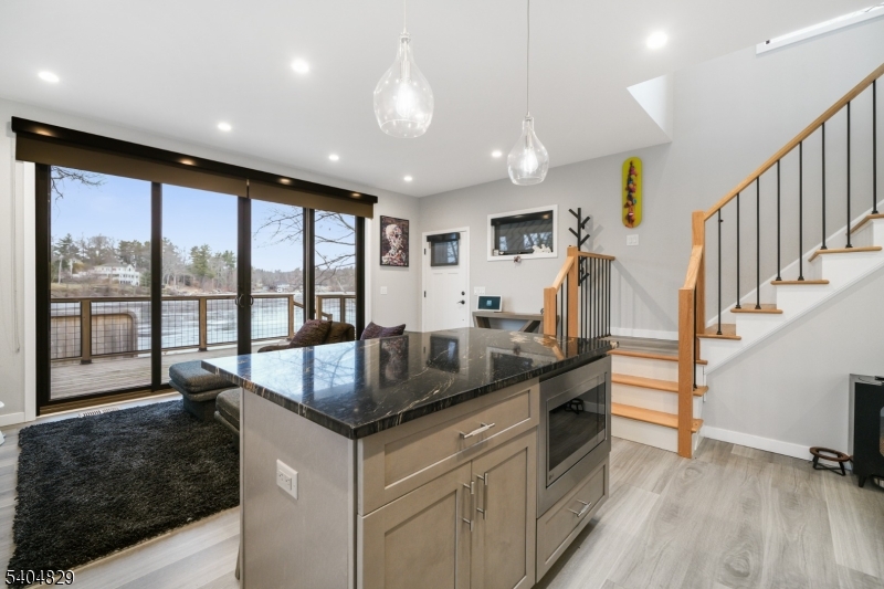 71 Witte Road West Milford, NJ 07421 - Photo 8 of 42 a kitchen with granite countertop a sink a counter top space and stainless steel appliances