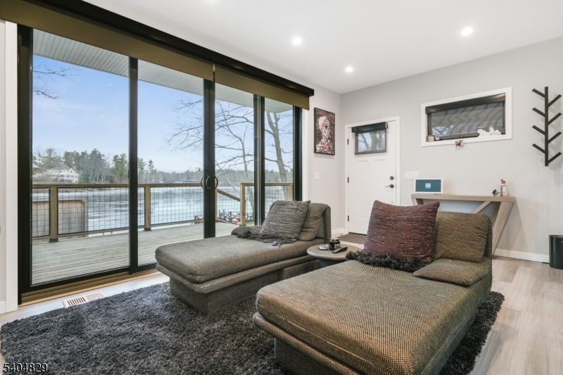 71 Witte Road West Milford, NJ 07421 - Photo 10 of 42 a living room with furniture and a large window