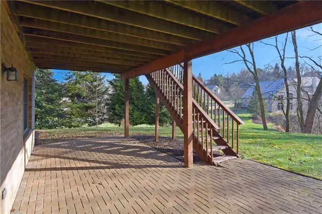 a view of outdoor space with deck and wooden floor