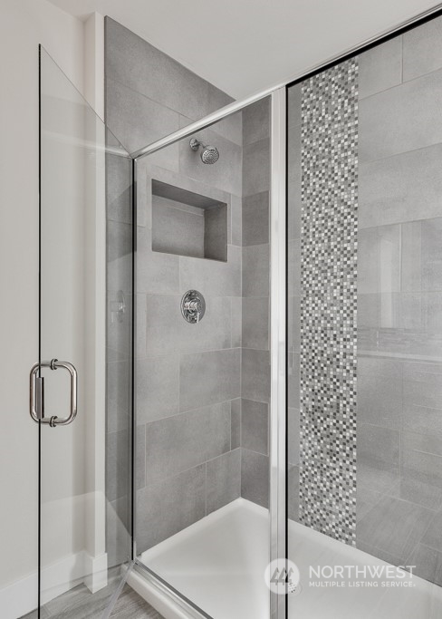 4012 171st Place Southeast Bothell, WA 98012 - Photo 22 of 28 a bathroom with a shower and a sink