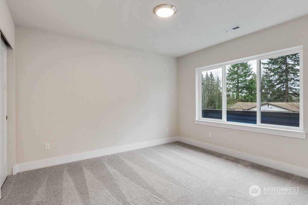 4012 171st Place Southeast Bothell, WA 98012 - Photo 26 of 28 an empty room with a window