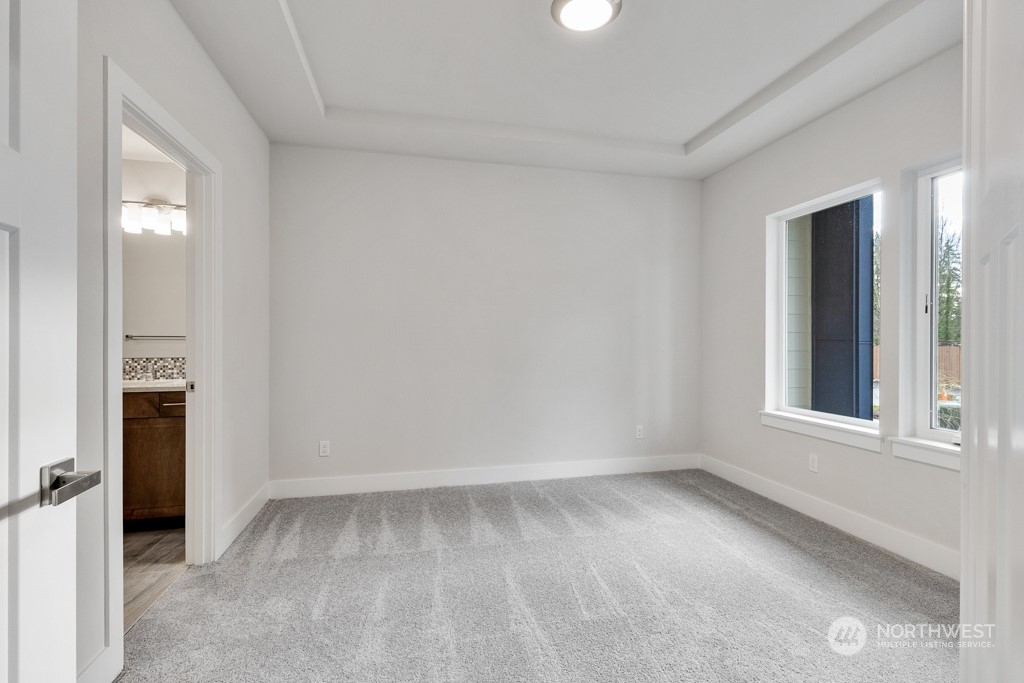 4012 171st Place Southeast Bothell, WA 98012 - Photo 3 of 28 an empty room with windows