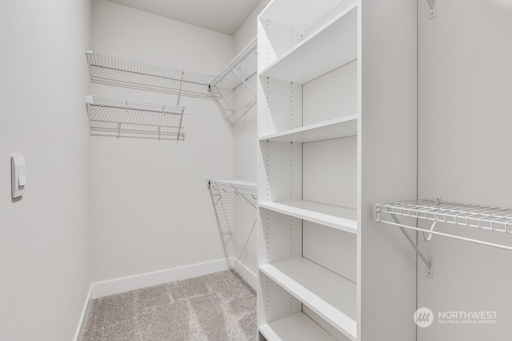 4012 171st Place Southeast Bothell, WA 98012 - Photo 6 of 28 a view of an empty walk in closet